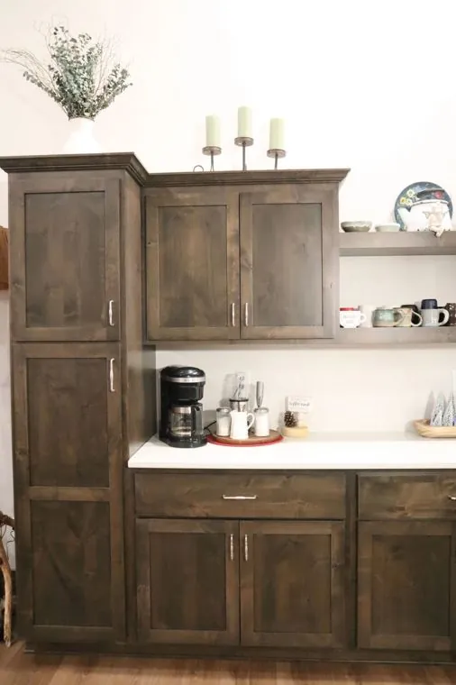Full-height alder pantry wall with a built-in coffee station — built by Amish Heritage Woodworks, Wisconsin