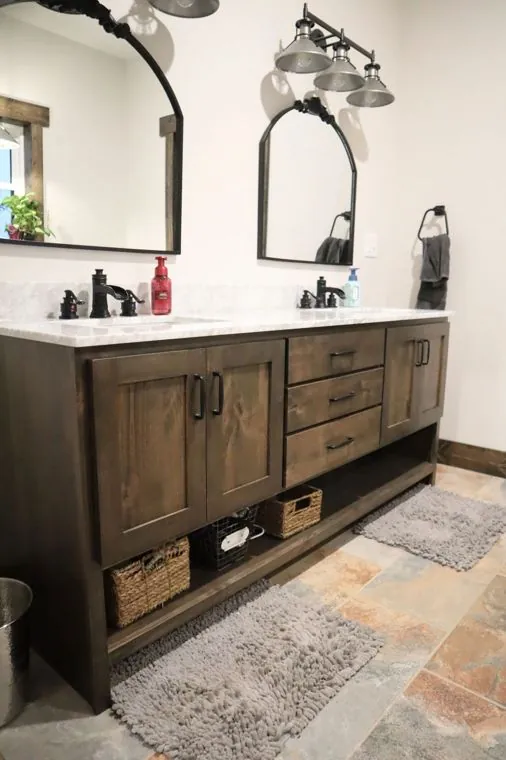 Double vanity with soft-close drawers and matching mirrors — built by Amish Heritage Woodworks, Wisconsin